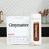 Graymatter Bright Mind cognitive support superfood drink mix and container.